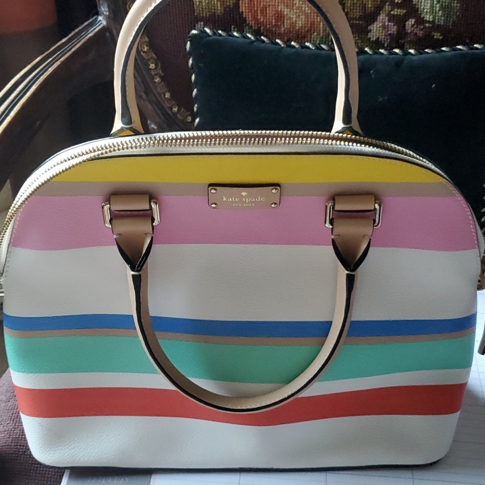 Kate Spade bag, with stipes and a shoulder strap